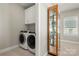 Convenient laundry room with washer and dryer at 13308 Oak Farm Ln, Huntersville, NC 28078