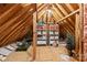 Unfinished attic with storage shelving and space at 15214 Mccomb Manor Ct, Charlotte, NC 28277