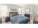 Well-lit bedroom with a double bed and modern nightstands at 15214 Mccomb Manor Ct, Charlotte, NC 28277