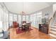 Breakfast nook with hardwood floors and large windows at 15214 Mccomb Manor Ct, Charlotte, NC 28277