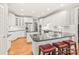 Modern kitchen with white cabinets and granite countertops at 15214 Mccomb Manor Ct, Charlotte, NC 28277