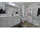 Double vanity bathroom with updated shower and bathtub at 176 Briana Marie Way, Indian Trail, NC 28079