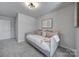 Spacious bedroom with daybed and neutral decor at 176 Briana Marie Way, Indian Trail, NC 28079