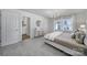 Main bedroom with king bed and access to en-suite bathroom at 176 Briana Marie Way, Indian Trail, NC 28079