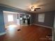 Open dining area with hardwood floors and kitchen access at 1814 Logie Ave, Charlotte, NC 28205