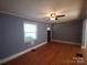 Living room with hardwood floors and neutral walls at 1814 Logie Ave, Charlotte, NC 28205