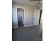 Bedroom featuring a ceiling fan, wood-look flooring, and open doorway to bathroom at 1875 Terrain Nw Dr, Conover, NC 28613