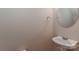 Small bathroom with vanity and round mirror at 201 Waterlynn Ridge Rd # E, Mooresville, NC 28117