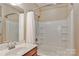 Clean bathroom with shower/tub combo and tile at 201 Waterlynn Ridge Rd # E, Mooresville, NC 28117