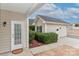 View of detached garage with storage and landscaping at 201 Waterlynn Ridge Rd # E, Mooresville, NC 28117