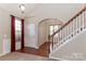 Bright entryway with hardwood floors and staircase at 201 Waterlynn Ridge Rd # E, Mooresville, NC 28117