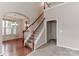 Elegant staircase leading to the second floor at 201 Waterlynn Ridge Rd # E, Mooresville, NC 28117