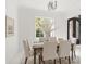 Formal dining room with large windows and modern light fixture at 209 E Glenview Dr, Salisbury, NC 28147