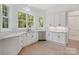 Modern kitchen with white cabinets and granite countertops at 209 E Glenview Dr, Salisbury, NC 28147