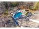 Aerial view of a home with a kidney-shaped pool at 209 Squirrel Ln, Lake Wylie, SC 29710