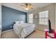 Bedroom with blue walls and ceiling fan at 209 Squirrel Ln, Lake Wylie, SC 29710