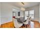 Elegant dining room with hardwood floors and modern chandelier at 209 Squirrel Ln, Lake Wylie, SC 29710