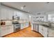 Spacious kitchen with granite countertops and stainless steel appliances at 209 Squirrel Ln, Lake Wylie, SC 29710