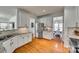 Modern kitchen with white cabinets, granite countertops, and stainless steel appliances at 209 Squirrel Ln, Lake Wylie, SC 29710