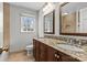 Double vanity bathroom with granite countertops at 2228 Valencia Ter, Charlotte, NC 28226