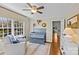 Well-lit Bedroom with a crib and comfortable seating area at 2228 Valencia Ter, Charlotte, NC 28226