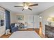 Bright bedroom with hardwood floors and access to a nearby bathroom at 2228 Valencia Ter, Charlotte, NC 28226