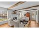 Living room with hardwood floors and exposed beams at 2228 Valencia Ter, Charlotte, NC 28226