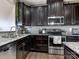 Modern kitchen with stainless steel appliances and granite countertops at 2262 Galloway Sw Ln # 330, Concord, NC 28025