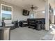 Covered patio with hot tub, seating area, and ceiling fan at 2262 Galloway Sw Ln, Concord, NC 28025