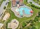 Aerial view of community pool, playground, and clubhouse at 2262 Galloway Sw Ln # 330, Concord, NC 28025