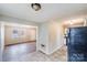 View from kitchen to living area, featuring tiled floors at 2331 Celia Ave, Charlotte, NC 28216