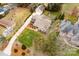 Aerial view of house and surrounding property, showcasing a large yard and detached garage at 260 Wood Duck Loop, Mooresville, NC 28117