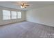 Spacious bedroom with gray carpet and large windows at 2841 Kinloch Ct, Clover, SC 29710