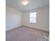 Bright bedroom with neutral walls and carpet at 2841 Kinloch Ct, Clover, SC 29710