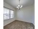 Bright dining room with hardwood floors and large windows at 2841 Kinloch Ct, Clover, SC 29710