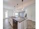 Kitchen island with granite countertops and stainless steel appliances at 2841 Kinloch Ct, Clover, SC 29710