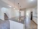 Kitchen with granite island, white cabinets and stainless steel appliances at 2841 Kinloch Ct, Clover, SC 29710