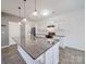 Modern kitchen with white cabinets, granite countertops, and stainless steel appliances at 2841 Kinloch Ct, Clover, SC 29710