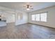 Open concept living room with hardwood floors and kitchen view at 2841 Kinloch Ct, Clover, SC 29710