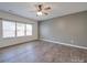 Bright living room with hardwood floors and ceiling fan at 2841 Kinloch Ct, Clover, SC 29710