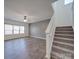 Spacious living room with hardwood floors and neutral walls at 2841 Kinloch Ct, Clover, SC 29710