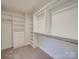 Spacious walk-in closet with shelves and hanging rods at 2841 Kinloch Ct, Clover, SC 29710