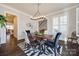 Spacious dining room with hardwood floors and a view into kitchen at 324 Mill Ridge Rd, Rock Hill, SC 29730