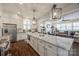 Spacious kitchen with island, stainless steel appliances, and white shaker cabinets at 324 Mill Ridge Rd, Rock Hill, SC 29730