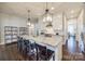 Modern kitchen with white cabinets, marble island, and high-end appliances at 324 Mill Ridge Rd, Rock Hill, SC 29730