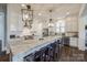 Modern kitchen with white cabinets, marble island, and high-end appliances at 324 Mill Ridge Rd, Rock Hill, SC 29730