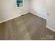 Spacious bedroom with wall-to-wall neutral carpeting at 333 S High St, Waxhaw, NC 28173