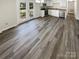 Kitchen with stainless steel appliances and vinyl plank flooring at 333 S High St, Waxhaw, NC 28173