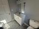 Bathroom with modern vanity and marble-look tile floor at 3463 Lake Shore S Dr, Denver, NC 28037