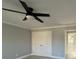 Bedroom with double doors and ceiling fan at 3463 Lake Shore S Dr, Denver, NC 28037